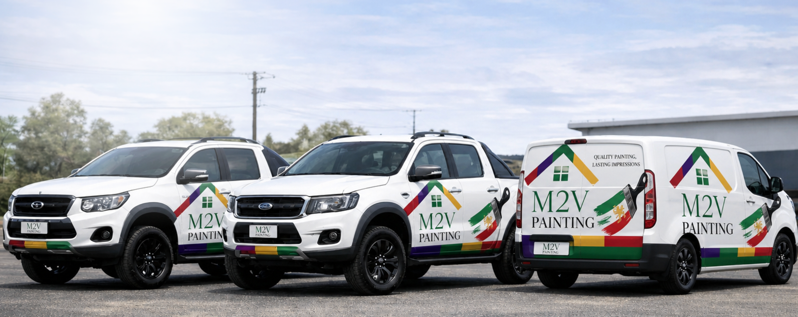 M2V Painting branded vehicles lined up together